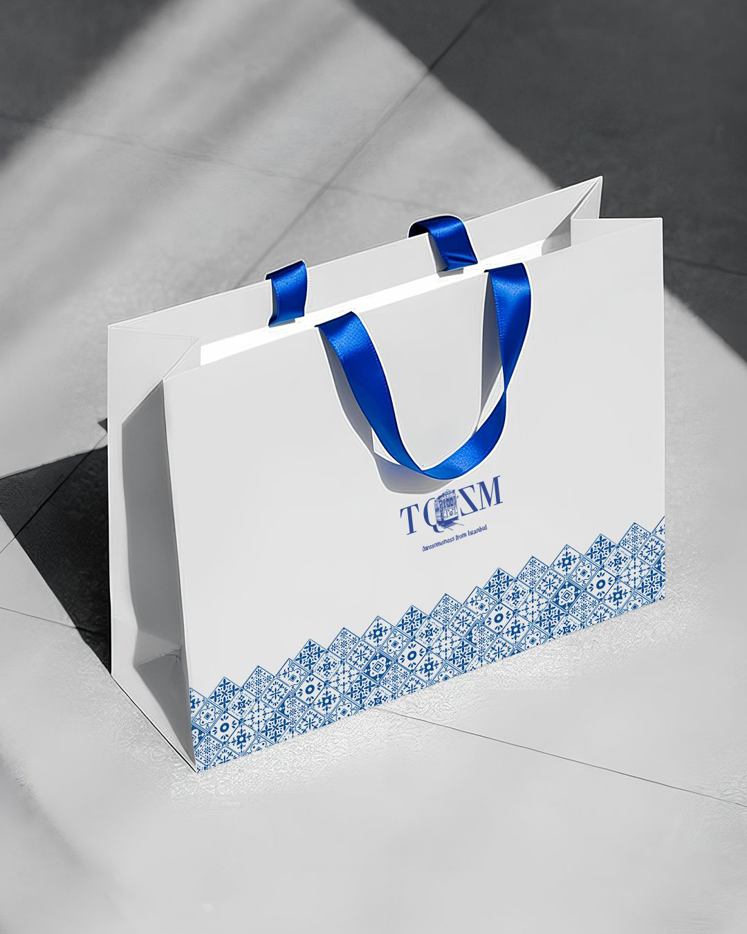 Túi giấy ivory quai truy băng lụa
